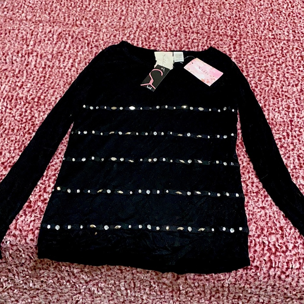 This is a beautiful black long sleeve size 14 shirt that is made by Kiddo
